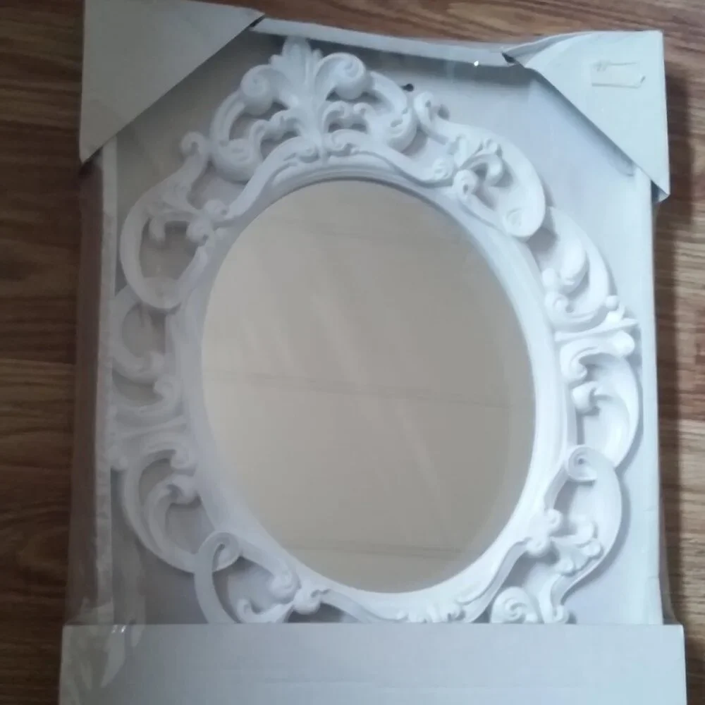 Source Unknown mirror white